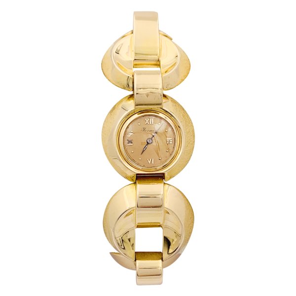 Hermès rose gold watch.
