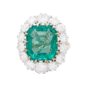 Pompadour platinum, gold, emeralds and diamonds ring.