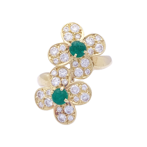 Bague Van Cleef & Arpels, "Fleurette", en or jaune, diamants et émeraudes.