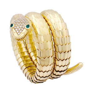 Bracelet Illario, "Serpent", or jaune, diamants, émeraudes.
