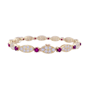 Van Cleef & Arpels gold, diamonds and rubies vintage bracelet, "Vintage Alhambra" collection.