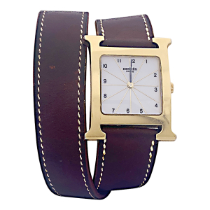 Gold plated Hermès watch "Heure H" collection, leather bracelet.