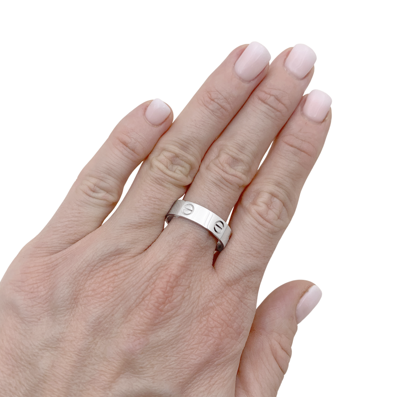 Bague Cartier, "Love Classique", or blanc.