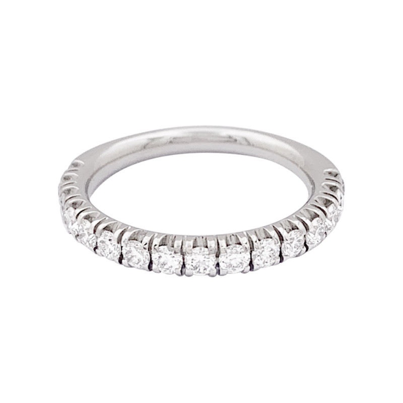 Cartier "Etincelle" eternity ring, platinum, diamonds.