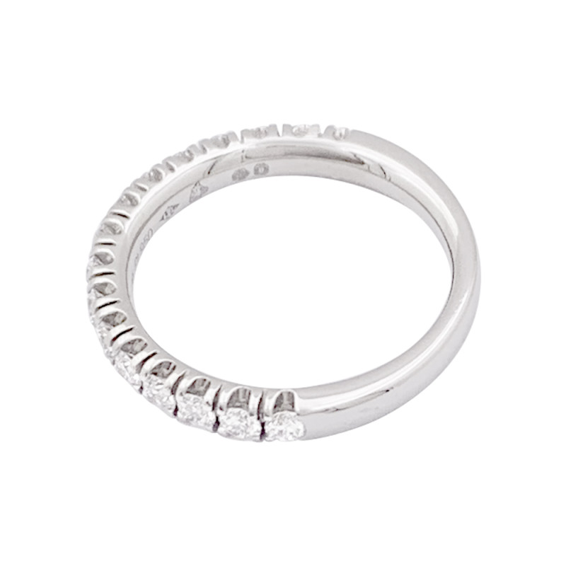 Cartier "Etincelle" eternity ring, platinum, diamonds.