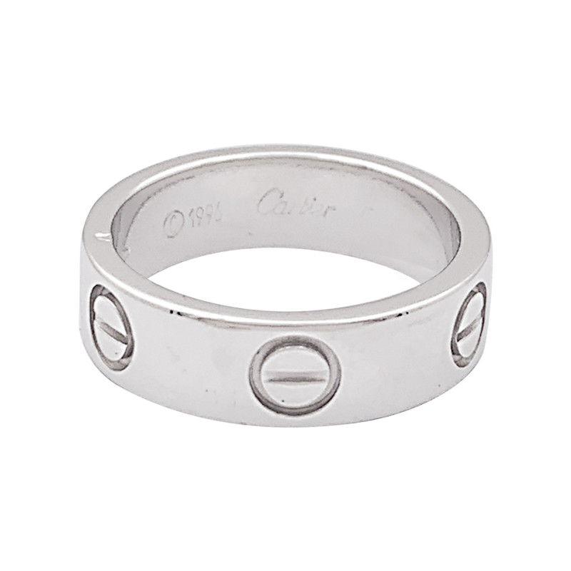 Bague Cartier "Love" or blanc.