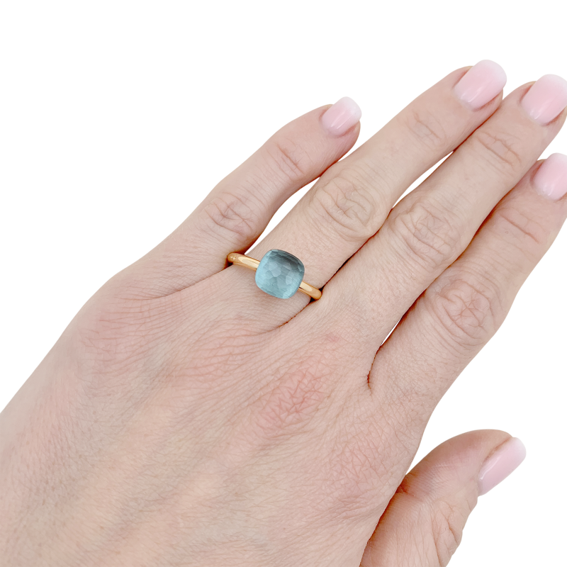 Bague Pomellato, "Nudo Petit", or rose, or blanc, topaze bleue.