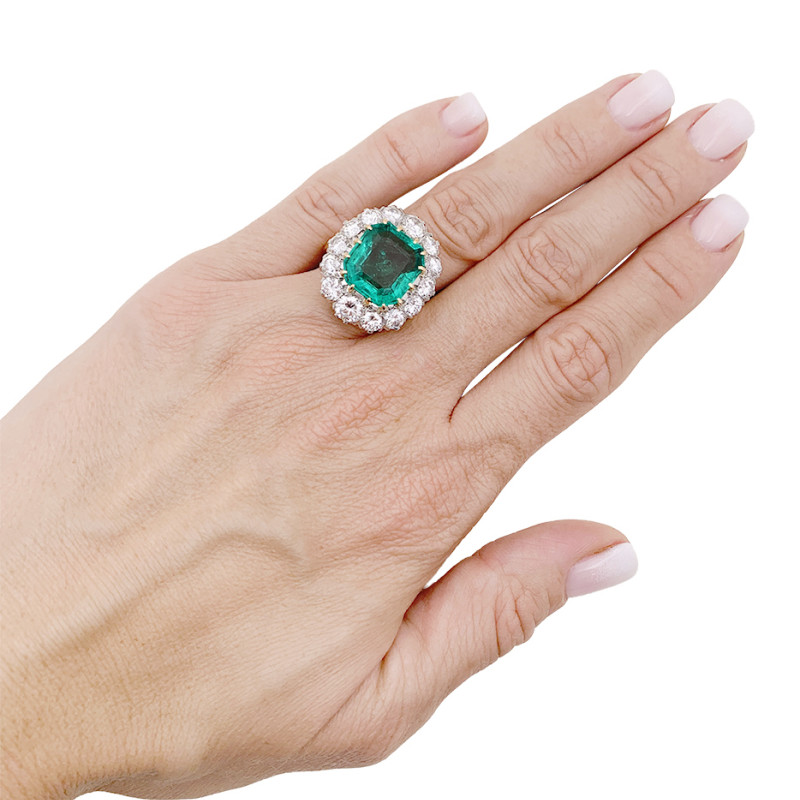 Pompadour platinum, gold, emeralds and diamonds ring.