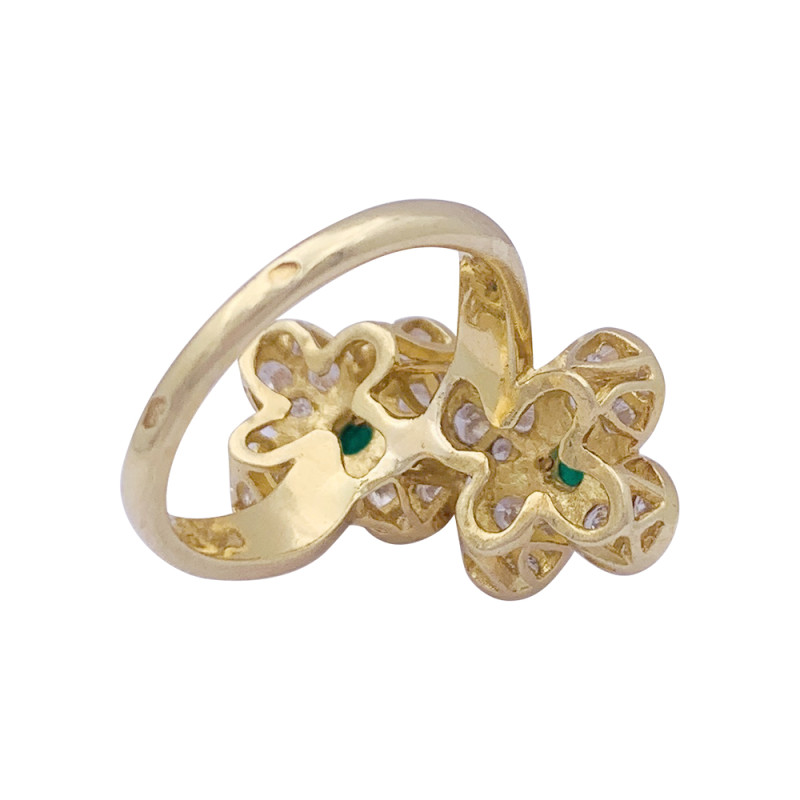 Bague Van Cleef & Arpels, "Fleurette", en or jaune, diamants et émeraudes.