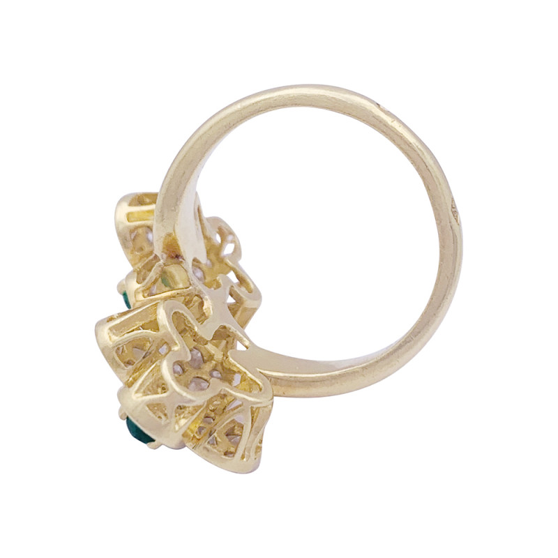 Bague Van Cleef & Arpels, "Fleurette", en or jaune, diamants et émeraudes.