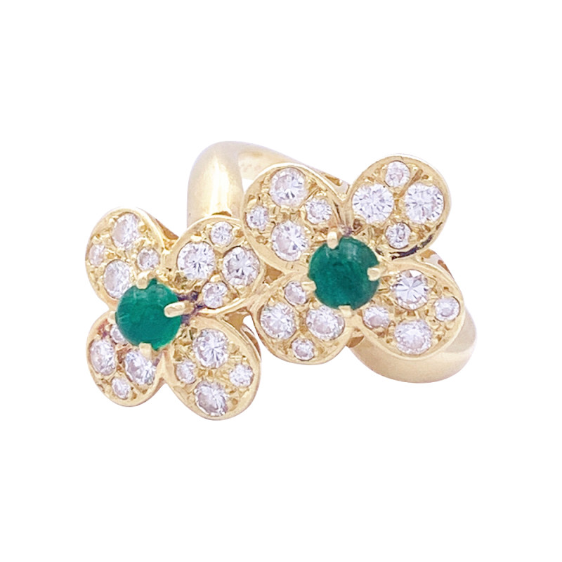 Bague Van Cleef & Arpels, "Fleurette", en or jaune, diamants et émeraudes.