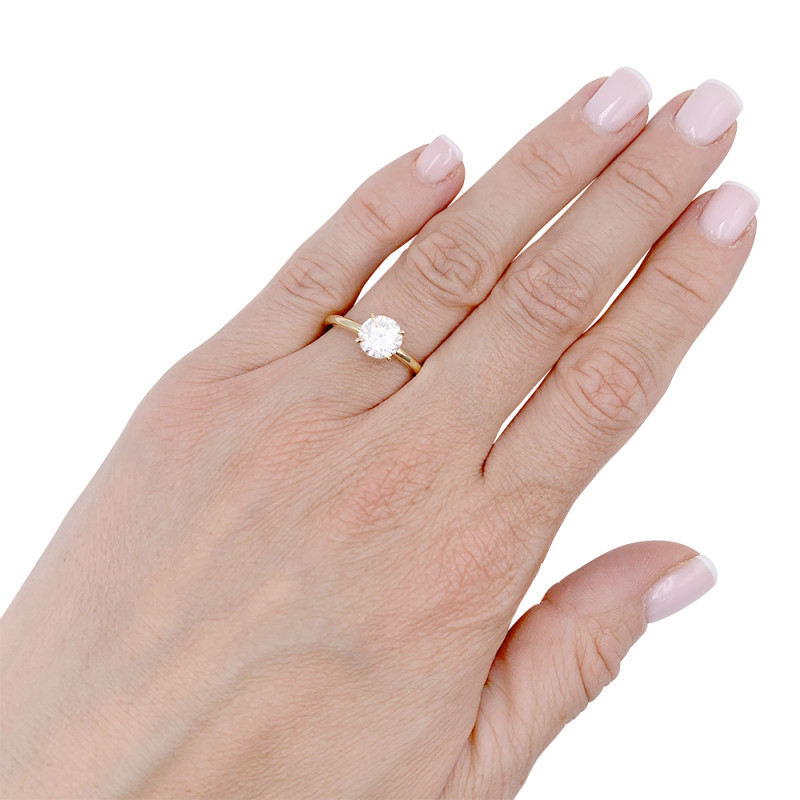 Yellow gold diamond solitary ring.