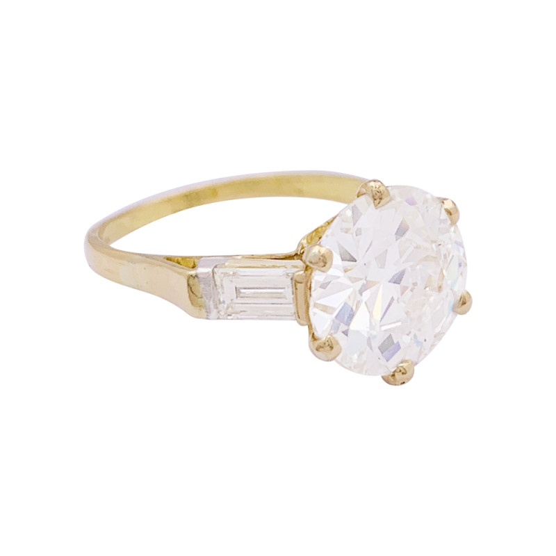 Bague solitaire or jaune, diamant 3,35 carats.