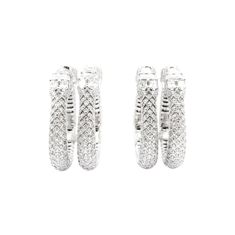 Boucles d'oreilles Repossi "Ophydienne", or blanc, diamants.