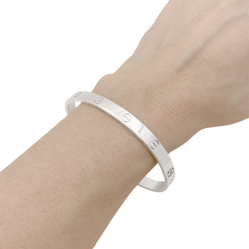 Bracelet Cartier "Love" or blanc.