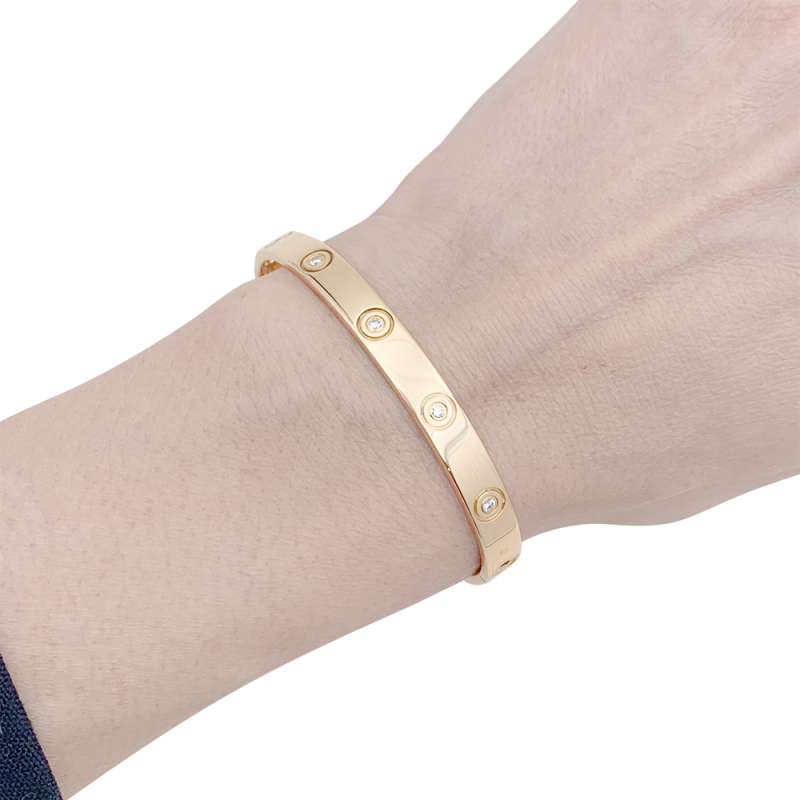 Cartier "Love" bracelet, gold, diamonds.