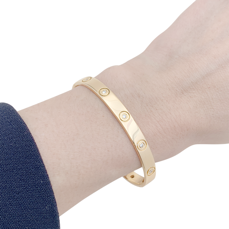 Cartier "Love" bracelet, gold, diamonds.