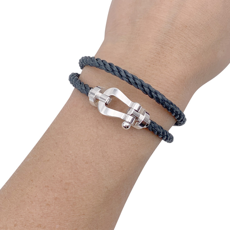 Bracelet Fred, "Force 10", en or blanc et acier.