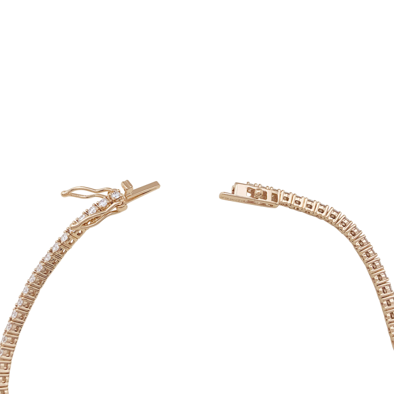 Bracelet ligne tennis or rose, diamants.