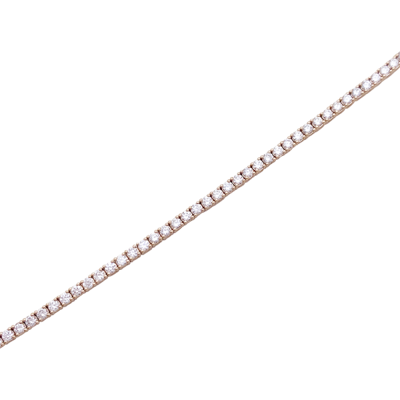 Bracelet ligne tennis or rose, diamants.