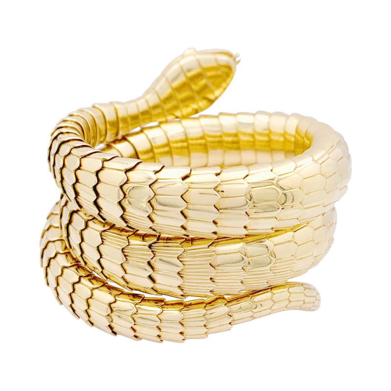 Bracelet Illario, "Serpent", or jaune, diamants, émeraudes.