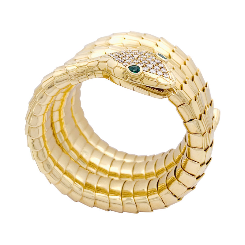 Bracelet Illario, "Serpent", or jaune, diamants, émeraudes.