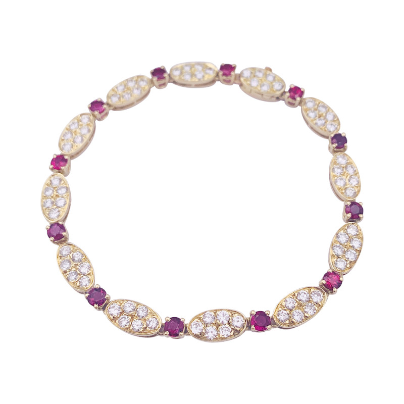 Van Cleef & Arpels gold, diamonds and rubies vintage bracelet, "Vintage Alhambra" collection.