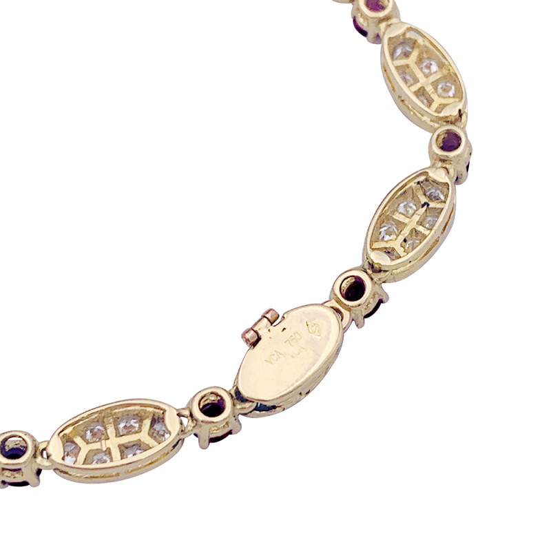 Van Cleef & Arpels gold, diamonds and rubies vintage bracelet, "Vintage Alhambra" collection.