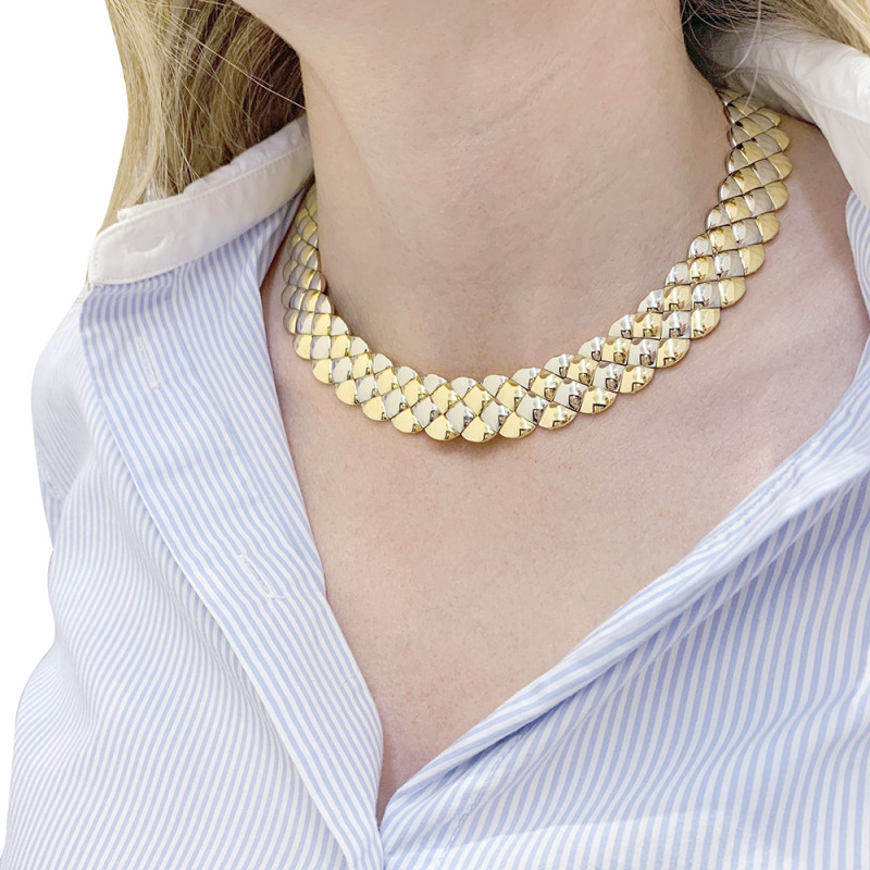 Collier Aldebert or jaune et blanc.