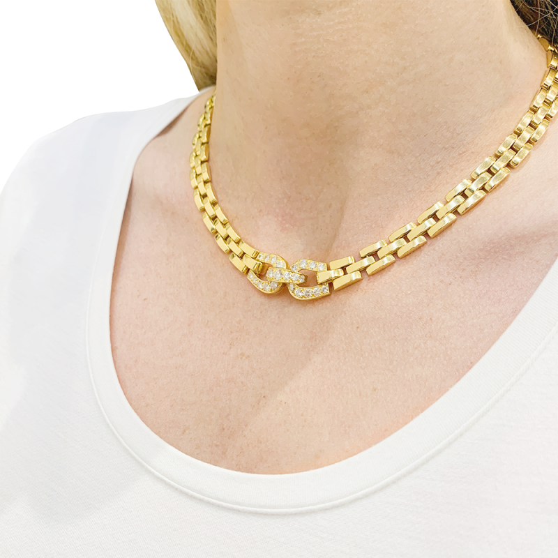 Collier Cartier, "Etrier", or jaune, diamants.