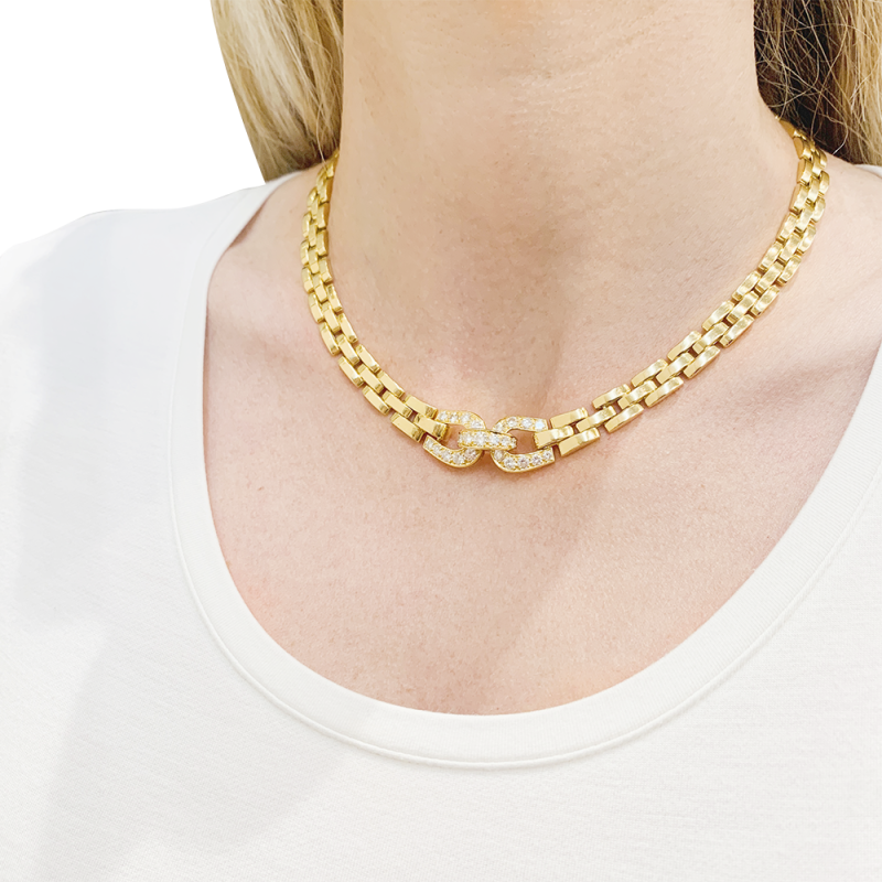 Collier Cartier, "Etrier", or jaune, diamants.