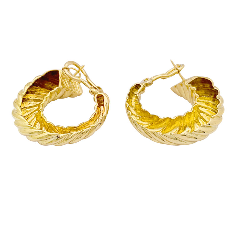 Yellow gold twisted hoops.