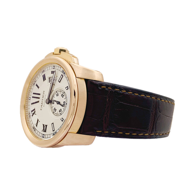 Cartier rose gold watch, "Calibre de Cartier" collection.