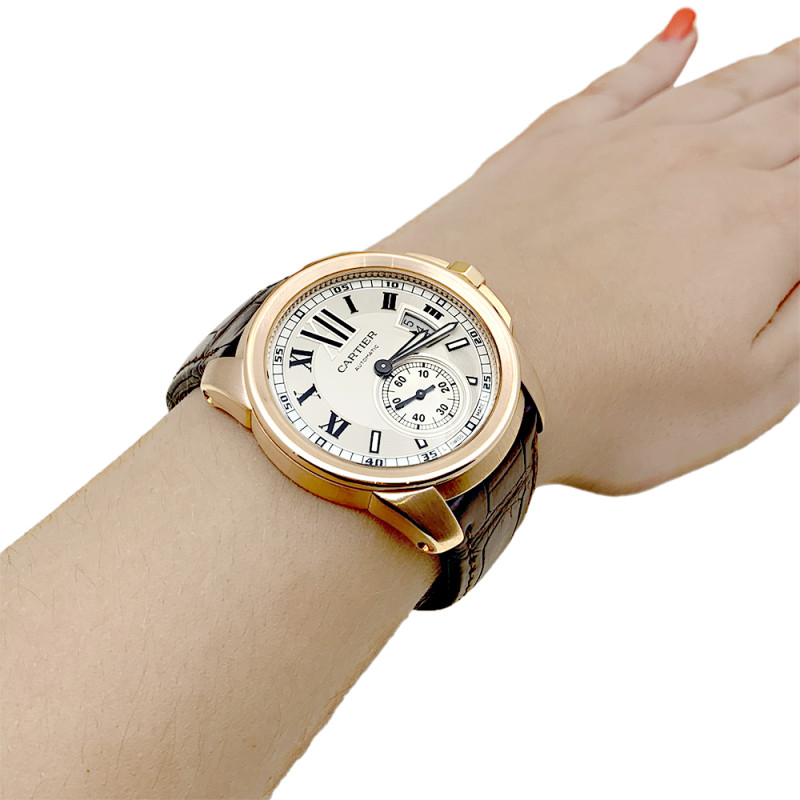 Cartier rose gold watch, "Calibre de Cartier" collection.