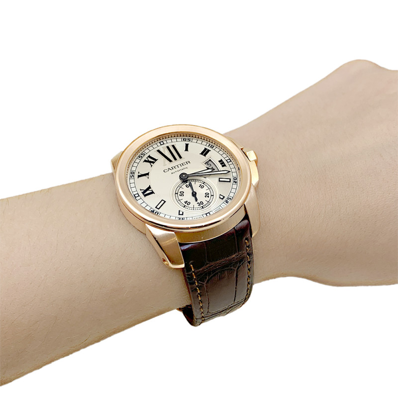 Cartier rose gold watch, "Calibre de Cartier" collection.