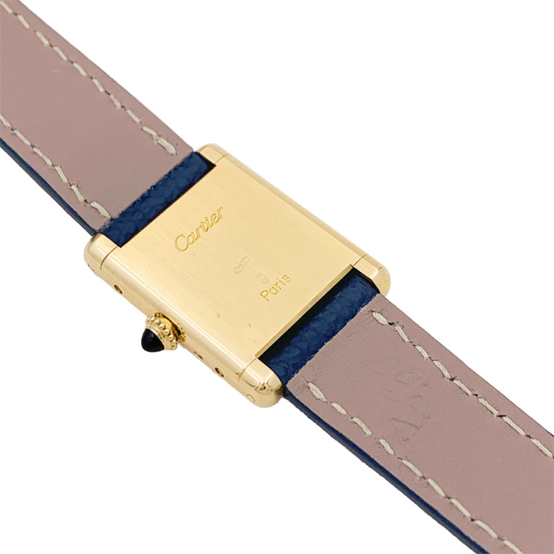 Cartier gold watch, "Tank Louis Cartier" collection.