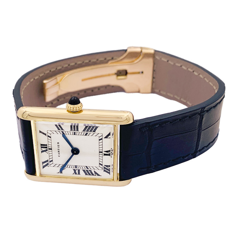 Cartier gold watch, "Tank Louis Cartier Extra Plate" collection.