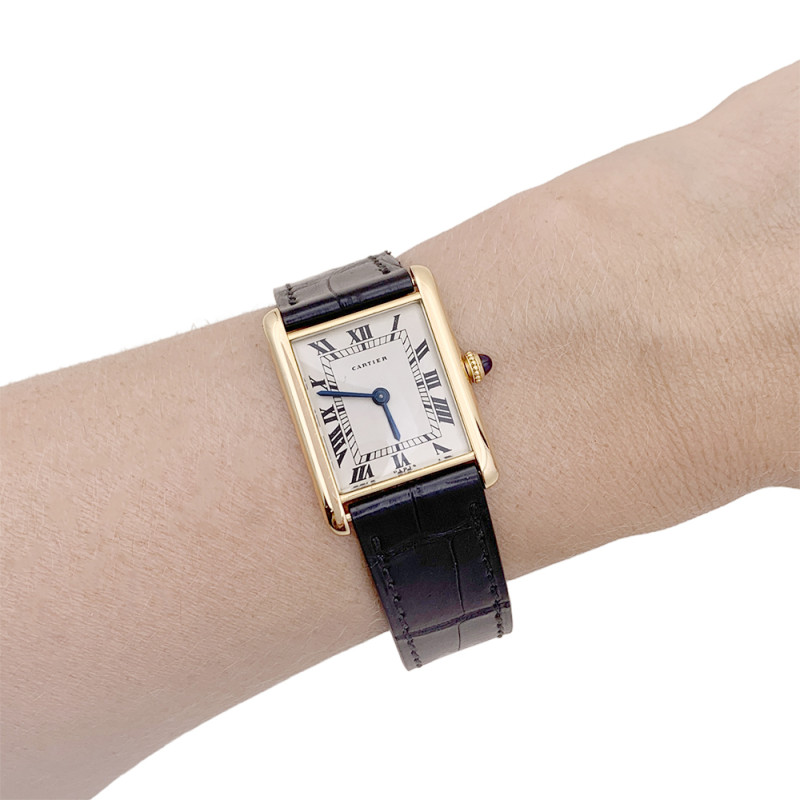 Cartier gold watch, "Tank Louis Cartier Extra Plate" collection.