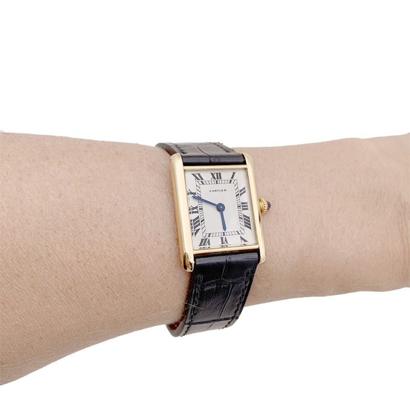 Cartier gold watch, "Tank Louis Cartier Extra Plate" collection.