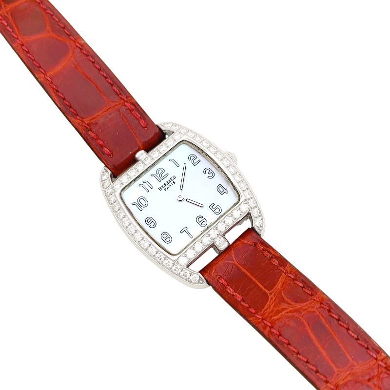 Montre Hermès, "Cape Cod Tonneau", en acier et diamants sur cuir.