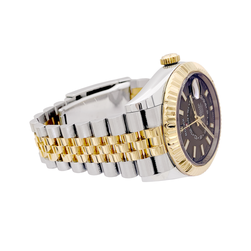 Montre Rolex "Sky Dweller" acier, or jaune.