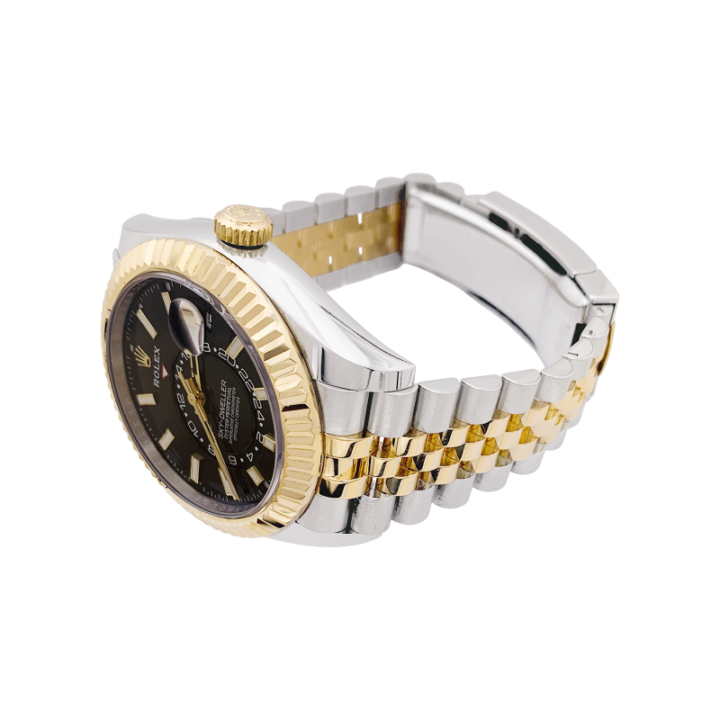 Montre Rolex "Sky Dweller" acier, or jaune.