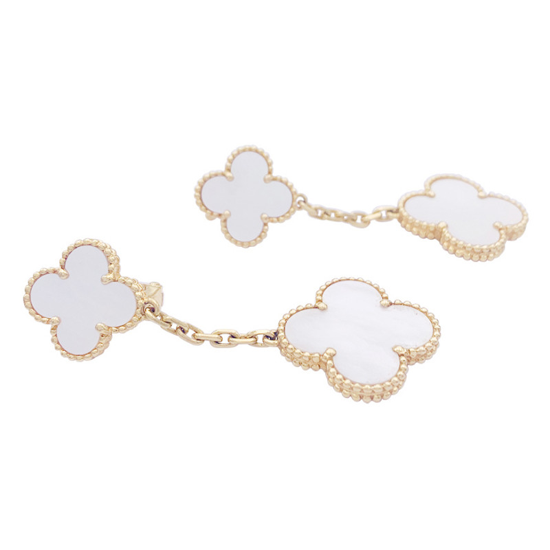 Van Cleef & Arpels gold earrings, “Magic Alhambra 2 motifs” collection.