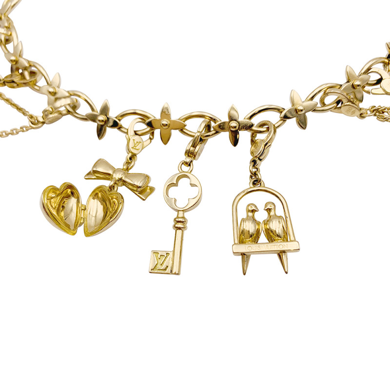 Louis Vuitton bracelet, Idylle collection, charms, yellow gold, white  gold, pearls.