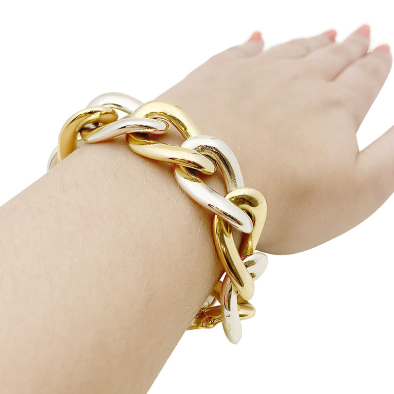 Bracelet Chaumet, gros maillons en deux tons d'or.