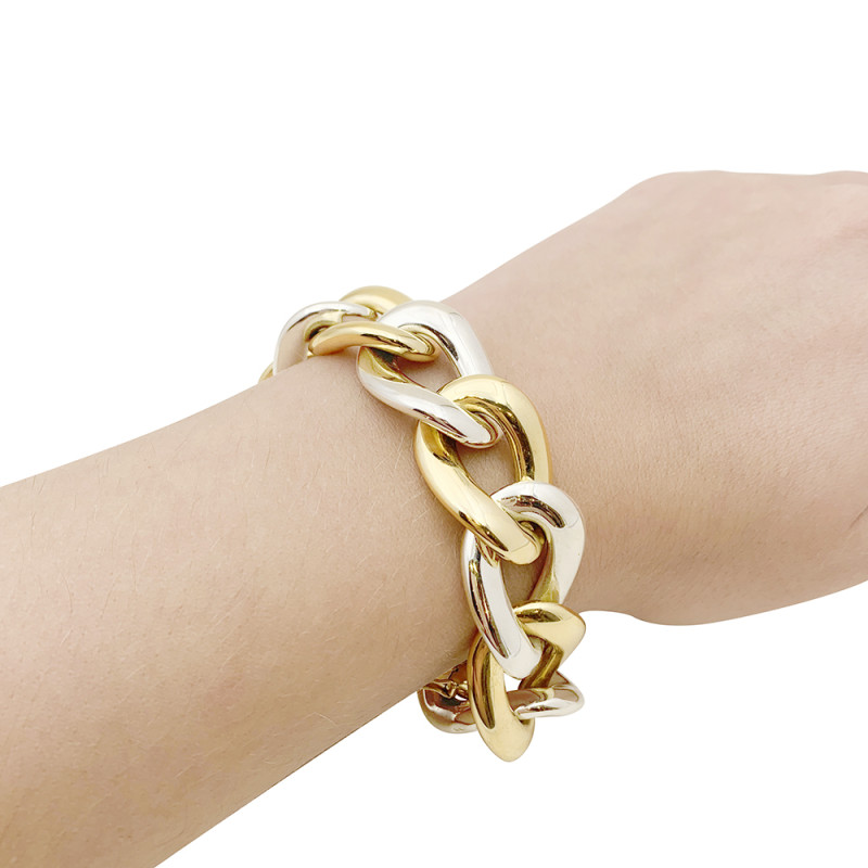 Bracelet Chaumet, gros maillons en deux tons d'or.