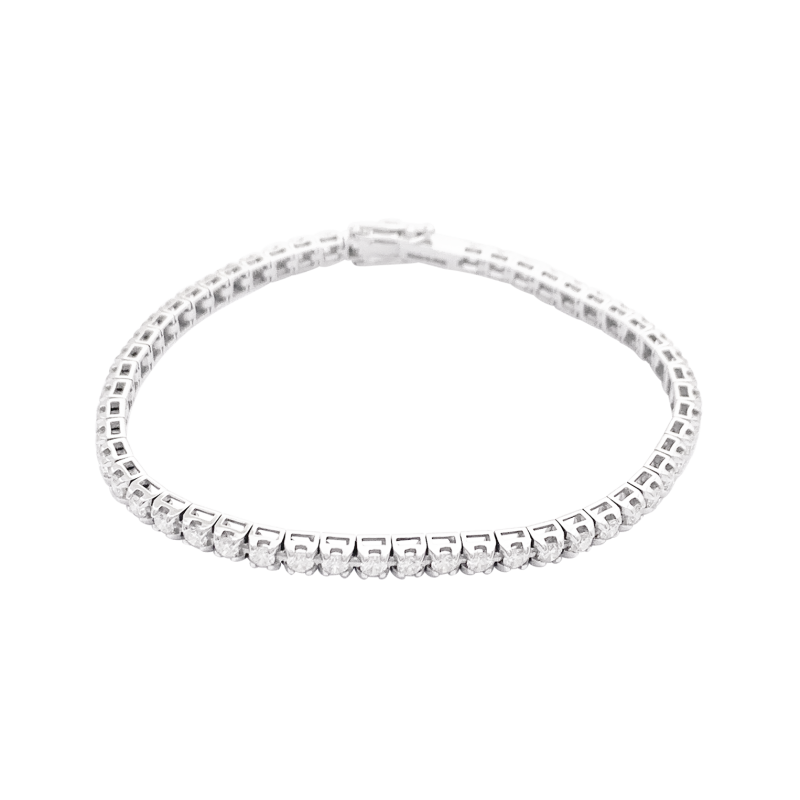 Ligne tennis Damiani or blanc, diamants.