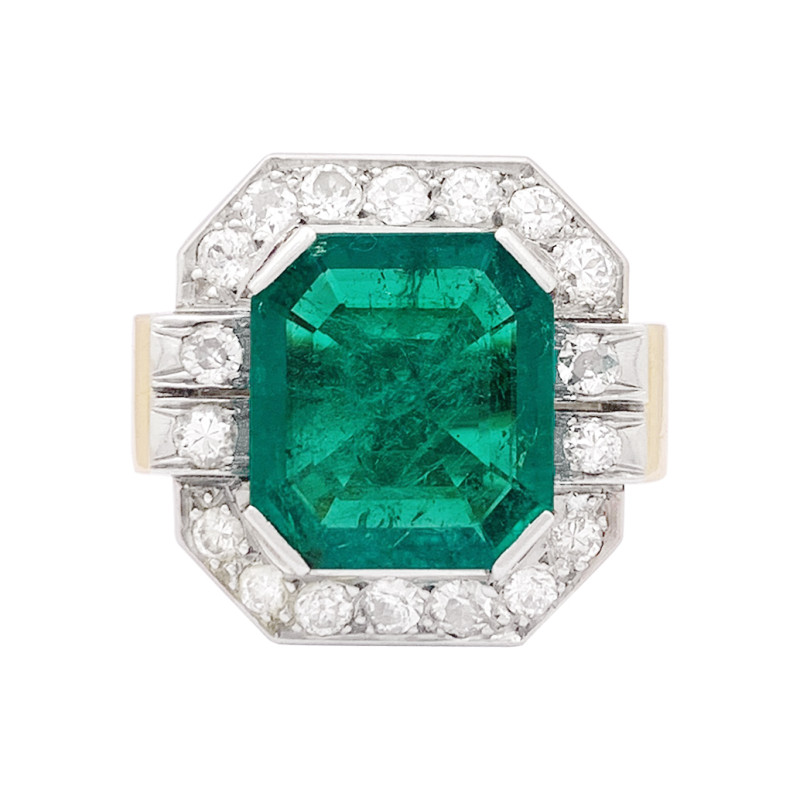 Vintage emerald, platinum, gold and diamonds ring.