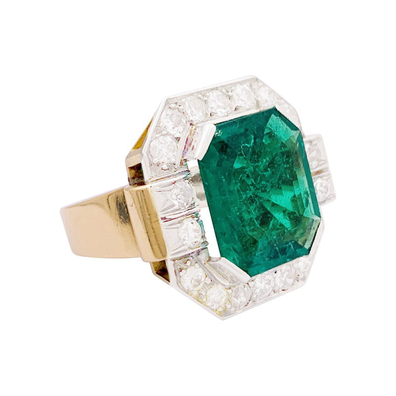 Vintage emerald, platinum, gold and diamonds ring.