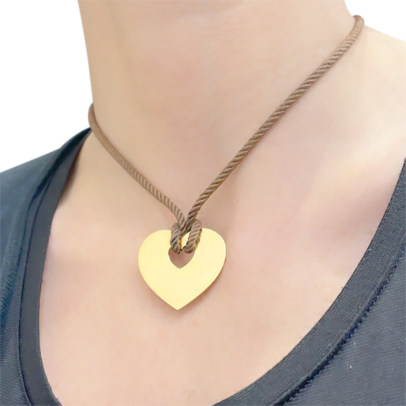 Poiray gold pendant, "Coeur Secret" collection.